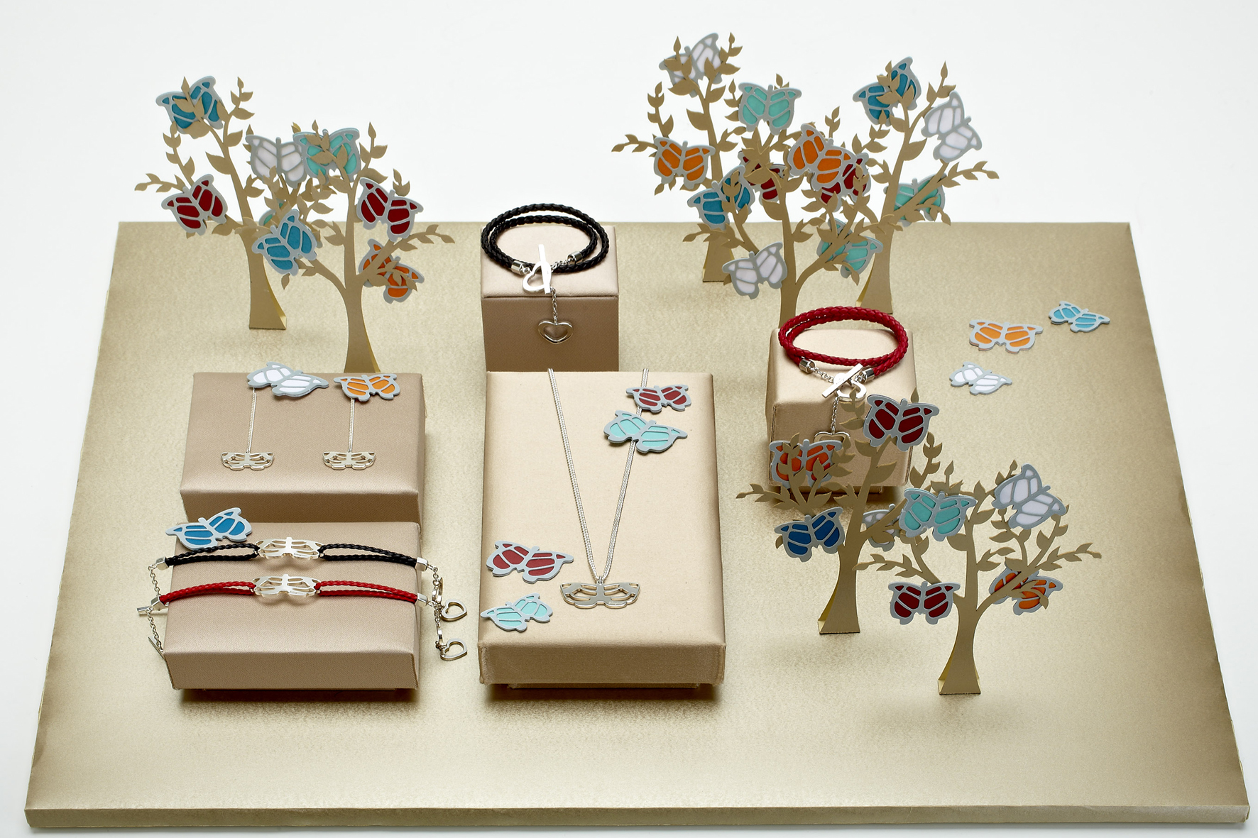 counter with paper trees and  butterflies